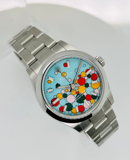 Rolex Women's Watch Oyster Perpetual 31 mm Turquoise Blue Dial Watch. Oyster Bracelet, Oystersteel Watch. Celebration Motif Dial.  Model # 277200