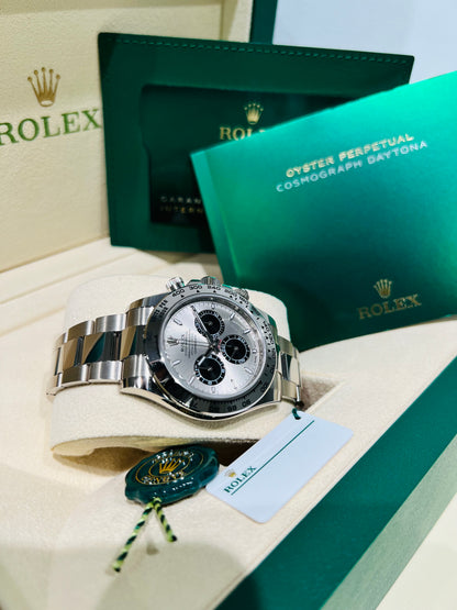 Rolex Cosmograph Daytona 40mm, Men's Watch 18K White Gold Silver Dial and Oyster Bracelet. Modle # 126509