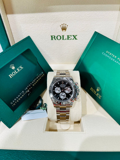 Rolex Cosmograph Daytona 40mm, Black Dial, Silver Panda, 18k White Gold, 18k White Gold Bezel, 18k White Gold Case and Bracelet, Automatic Movement, Sapphire Crystal and Men’s Watch/Unisex.   Model # 126509