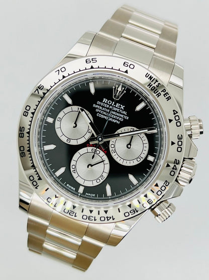 Rolex Cosmograph Daytona 40mm, Black Dial, Silver Panda, 18k White Gold, 18k White Gold Bezel, 18k White Gold Case and Bracelet, Automatic Movement, Sapphire Crystal and Men’s Watch/Unisex.   Model # 126509