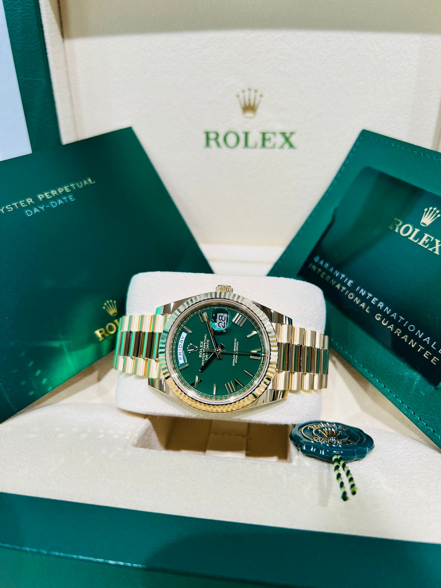 Rolex Day-Date, Green Roman Dial, Fluted Bezel, 18K Gold Presidential Bracelet.  Model # 228238