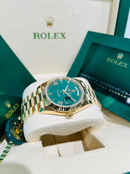 Rolex Day-Date, Green Roman Dial, Fluted Bezel, 18K Gold Presidential Bracelet.  Model # 228238