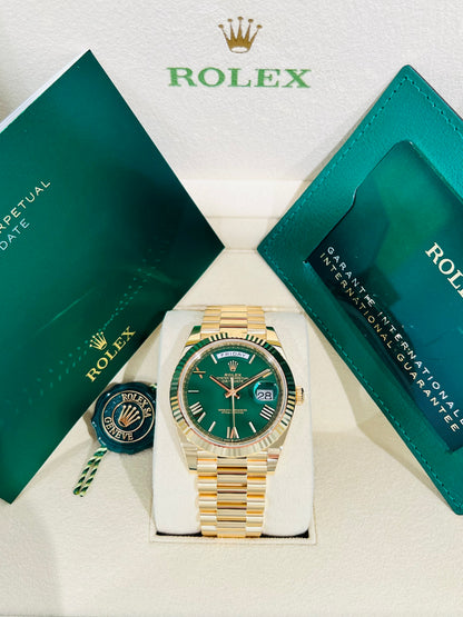 Rolex Day-Date, Green Roman Dial, Fluted Bezel, 18K Gold Presidential Bracelet.  Model # 228238