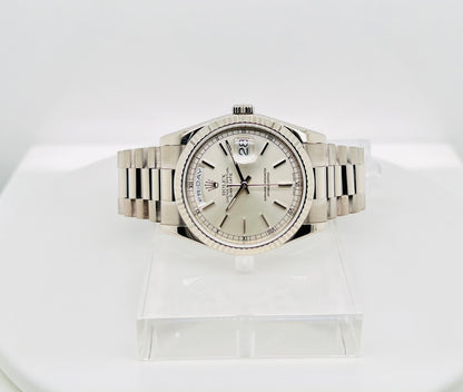 Rolex Day-Date 36mm, White Gold Silver Index Dial with Roman Indices, 18k White Gold Fluted Bezel, White Gold Case, 18k White Gold Presidential Bracelet. Model# 18239