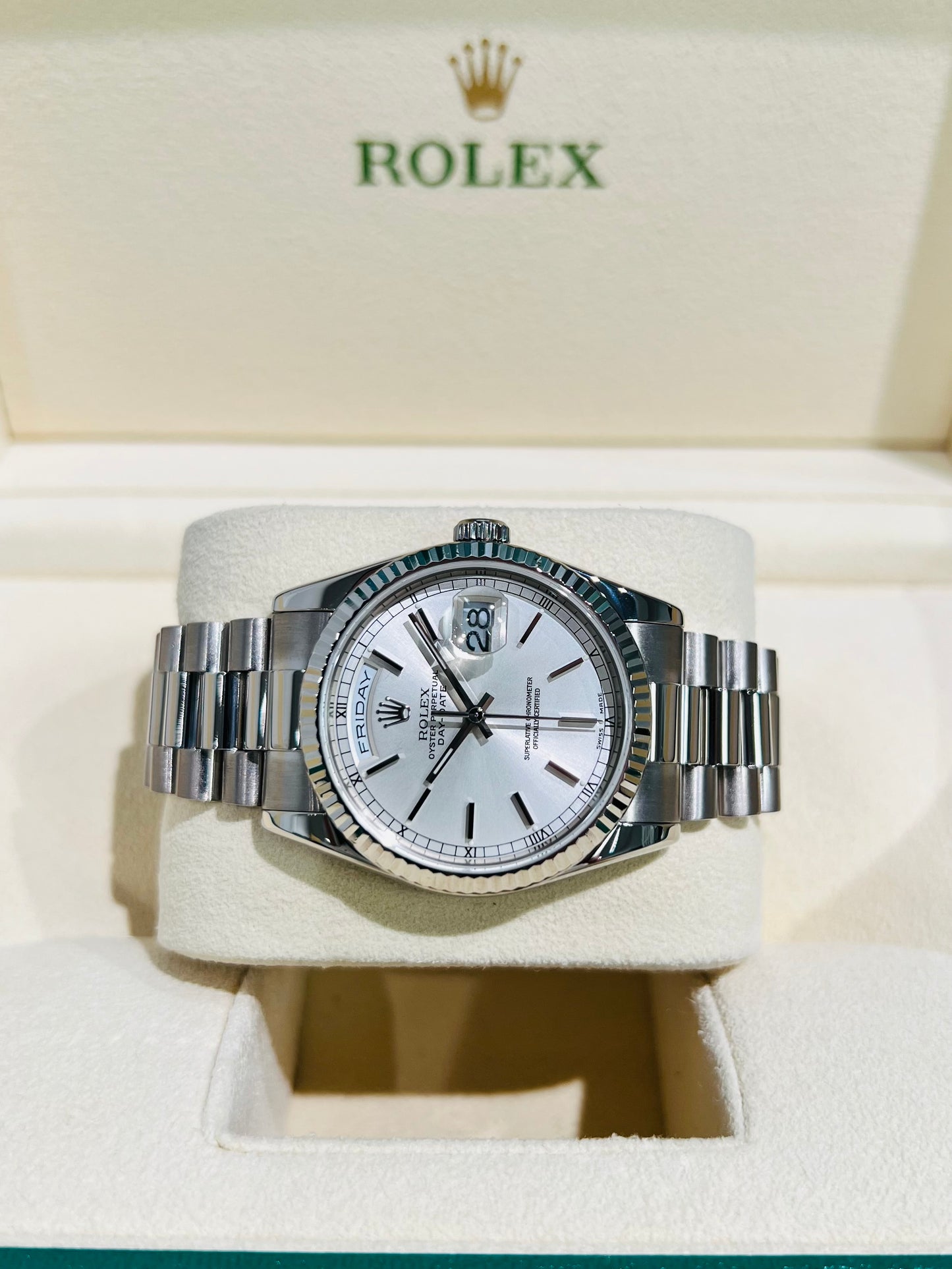 Rolex Day-Date 36mm, White Gold Silver Index Dial with Roman Indices, 18k White Gold Fluted Bezel, White Gold Case, 18k White Gold Presidential Bracelet. Model# 18239