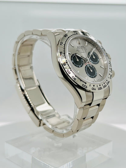 Rolex Cosmograph Daytona 40mm, Men's Watch 18K White Gold Silver Dial and Oyster Bracelet. Model #126509