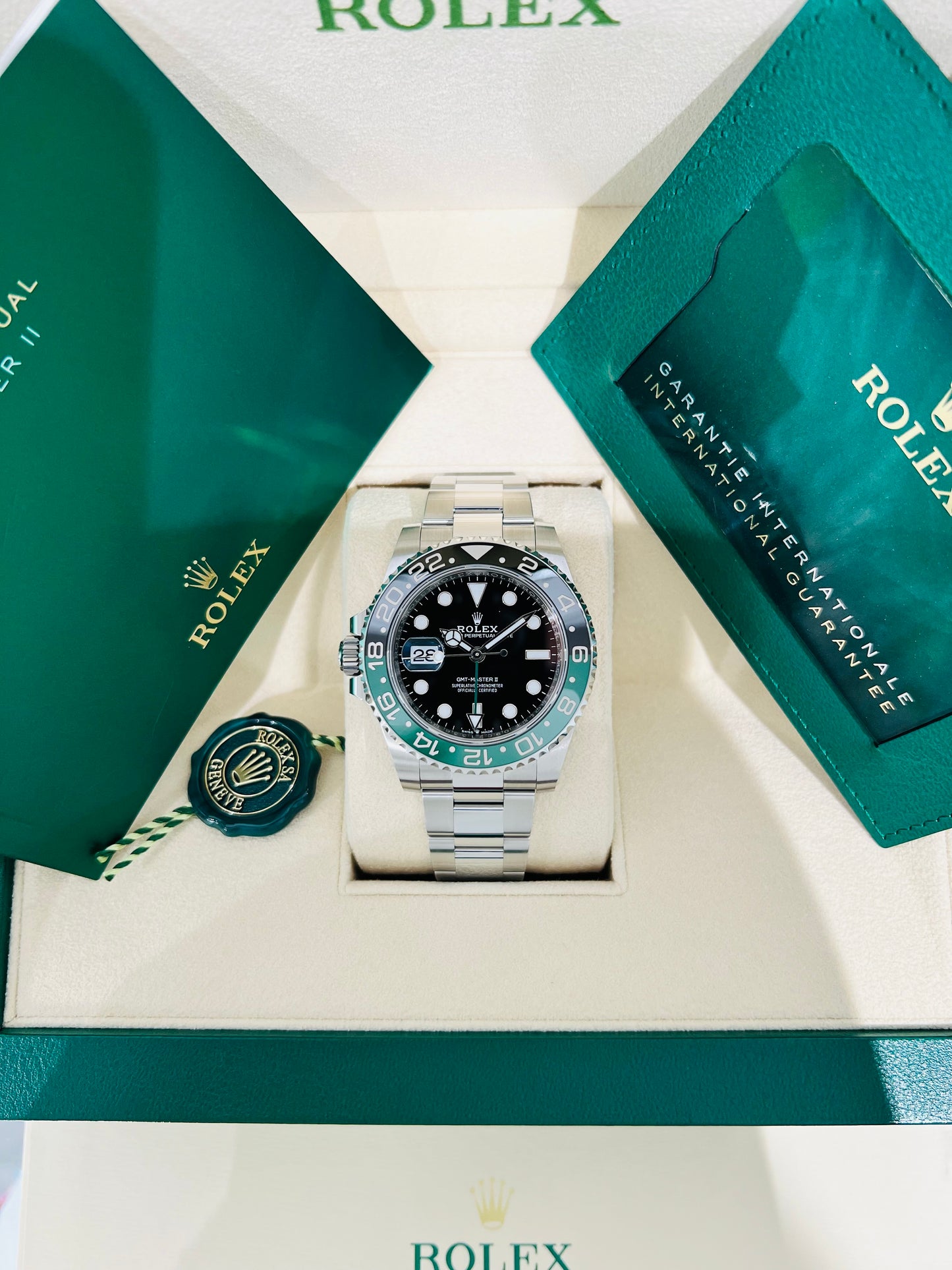 Rolex GMT-Master II 40mm Black Dial and Black & Green Bezel Oystersteel Men's Pre-owned Watch Model # 126720VTNR