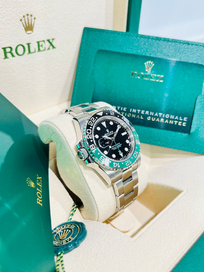 Rolex GMT-Master II 40mm Black Dial and Black & Green Bezel Oystersteel Men's Pre-owned Watch Model # 126720VTNR